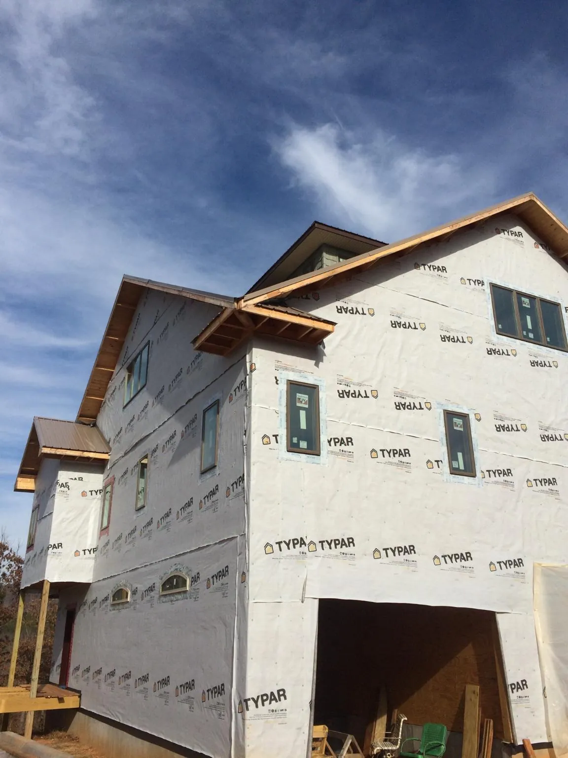 Stick built house wrapped in Typar with new roof framing and dormers in Star